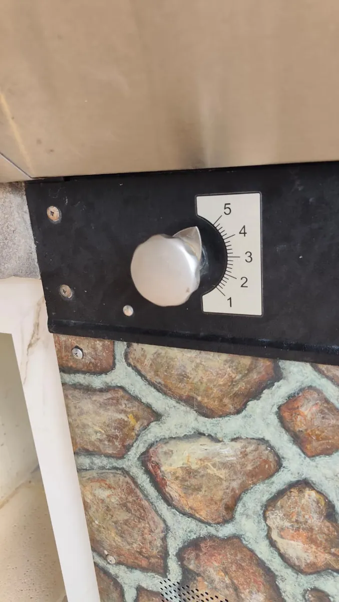 Perilla de control de la llama del horno, con escala del 1 al 5